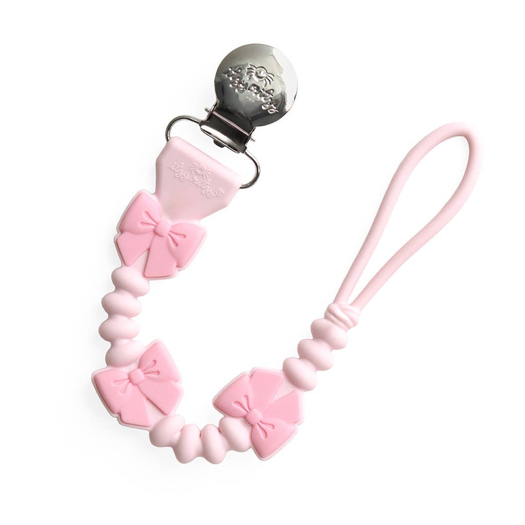 Itzy Paci Strap Plus™: Pink Bows