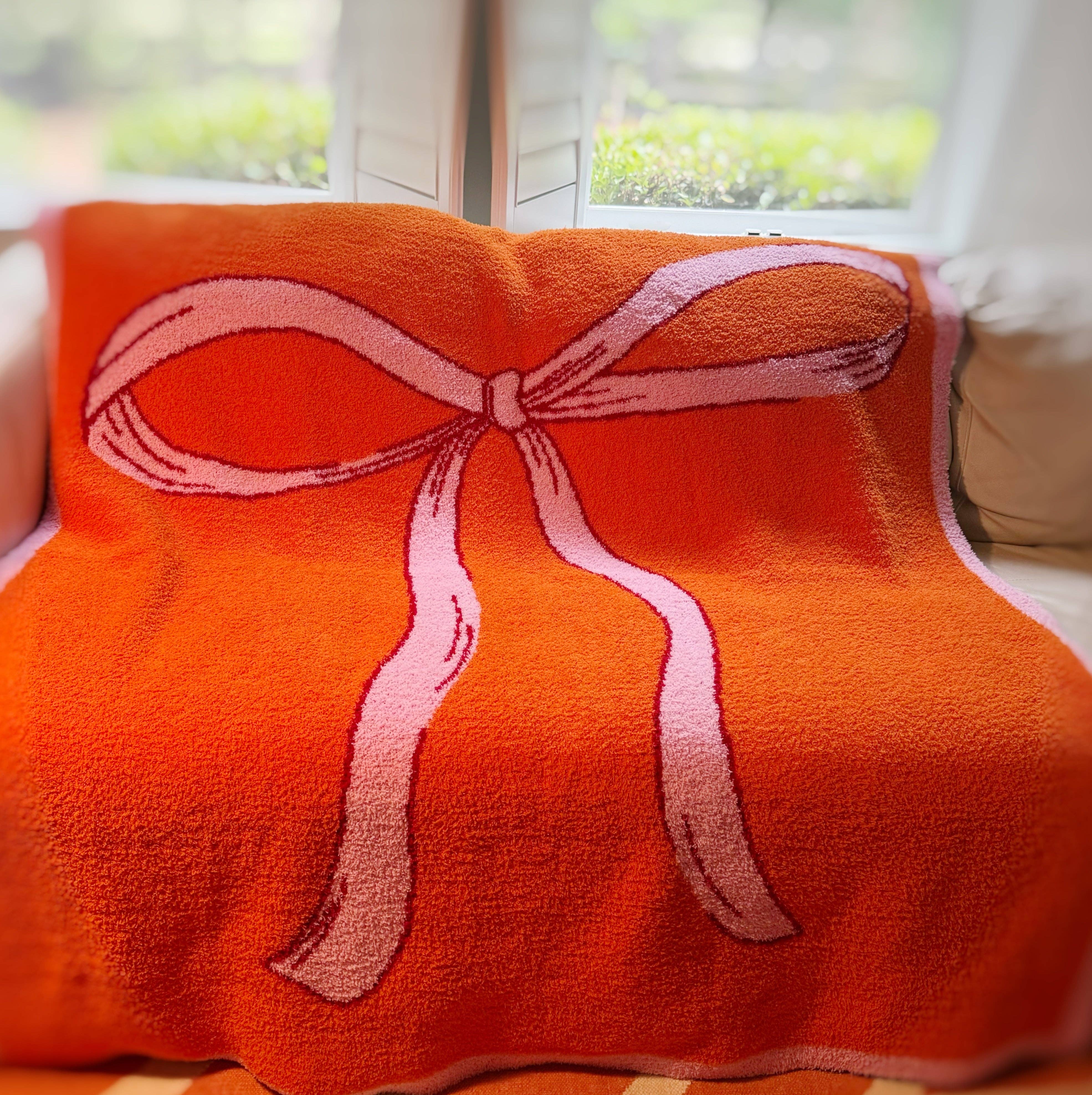 The Big Bow Coziest Blanket in Orange & Pink