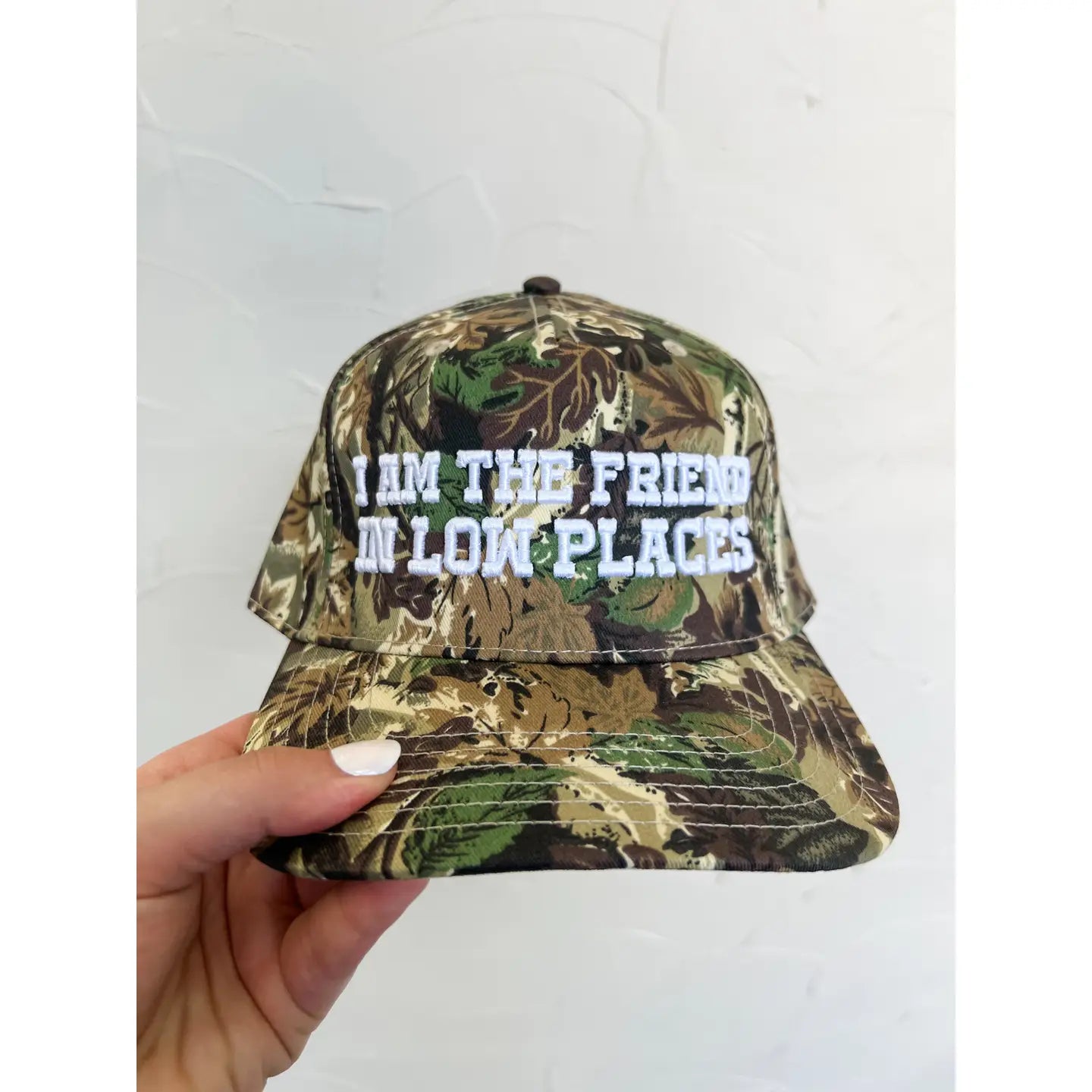 Friend in Low Places Trucker Hat