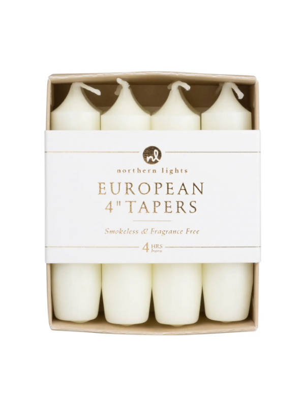 A pack of white taper candles