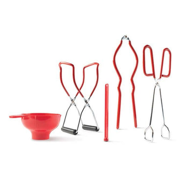 Set of red kitchen tools including a funnel, tongs, and ladle on a white background