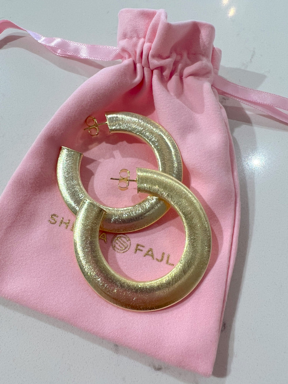 Irene Hoops by Sheila Fajl