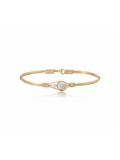 Gold bracelet with a central pearl on a white background