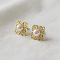 Gold and pearl auspicious detail stud earrings