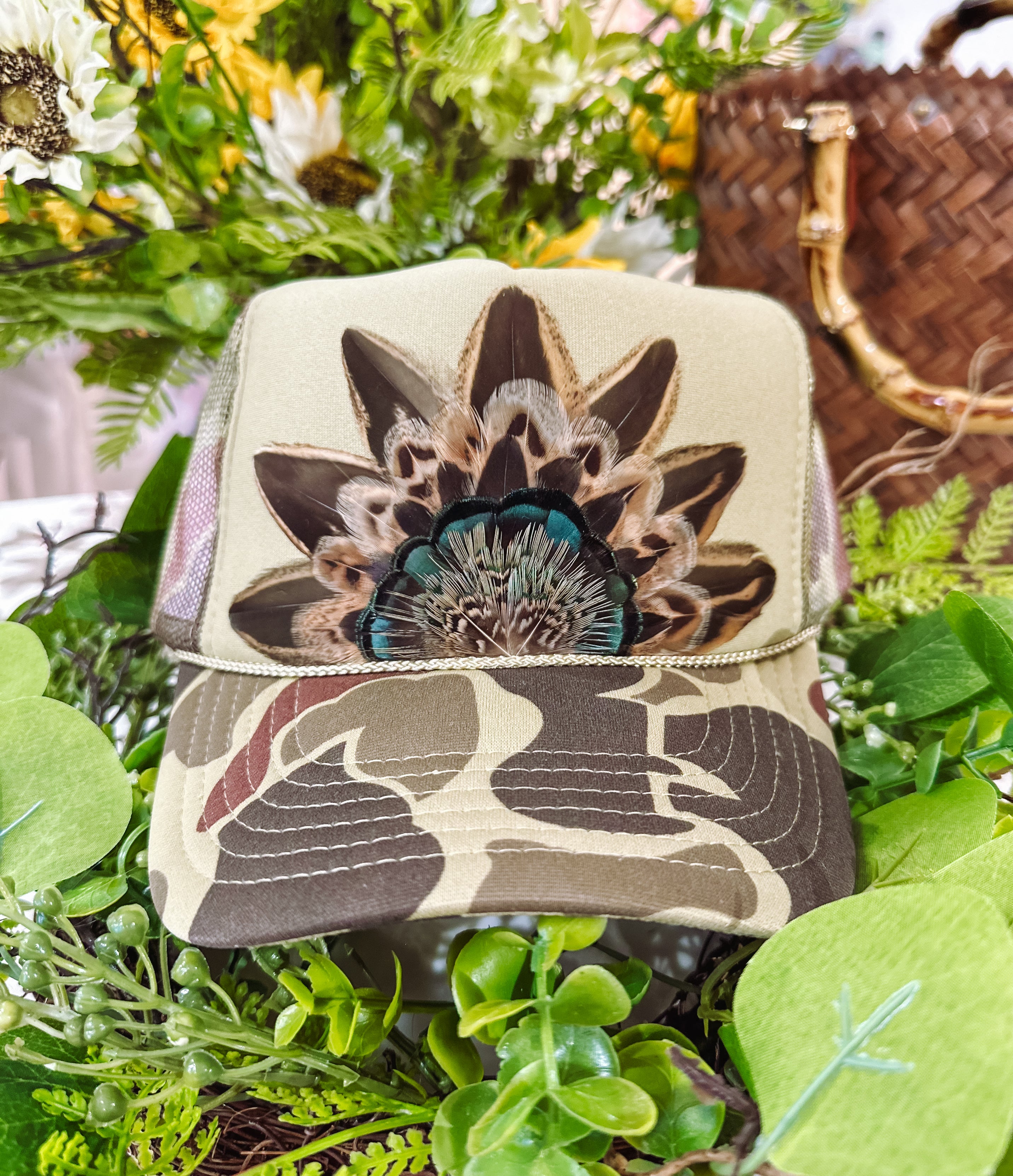The Genevieve Camo Feathered Trucker Hat