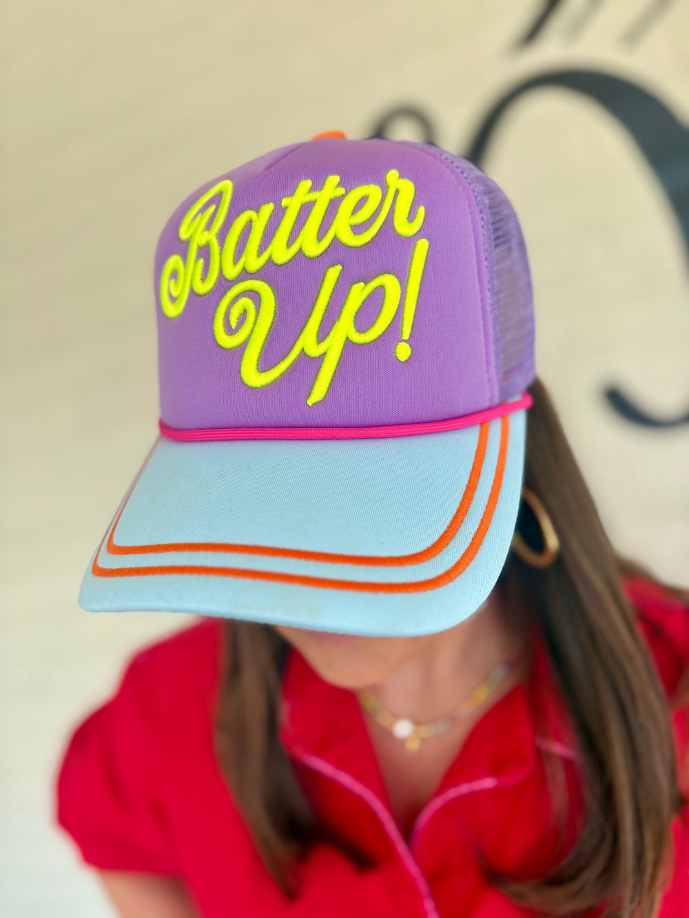 Purple and blue cap with 'Batter Up!' text neon baseball season trucker hat