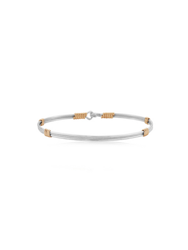 Gold and silver wire bracelet by Ronaldo, a timeless piece that can be worn for years to come 