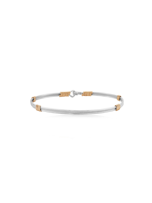 Gold and silver wire bracelet by Ronaldo, a timeless piece that can be worn for years to come 