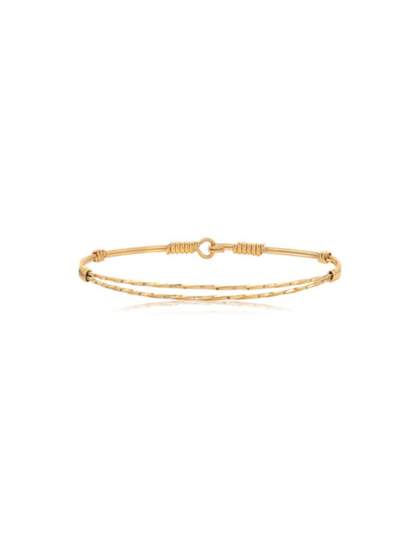 Gold bracelet on a white background