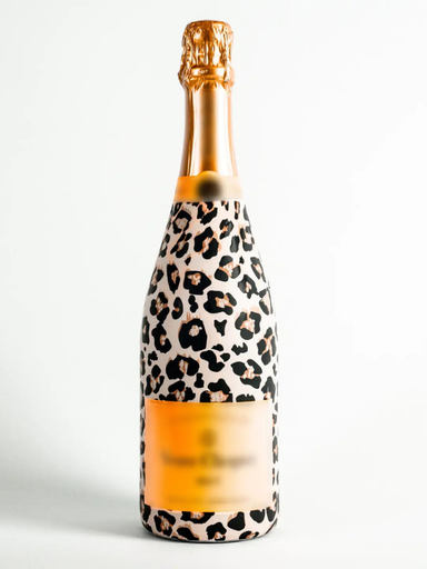 Bottle of champagne with a leopard print wrap 