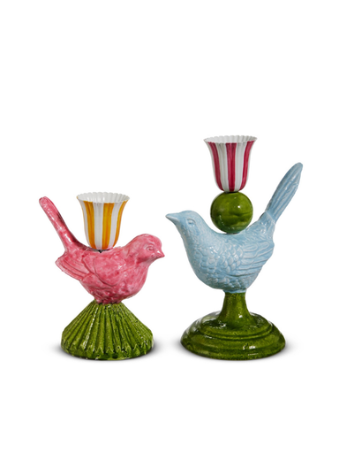 Two ceramic bird-shaped candle holders, one pink and one blue