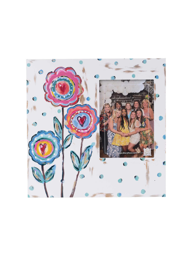 Decorative photo frame with colorful floral designs on a white background