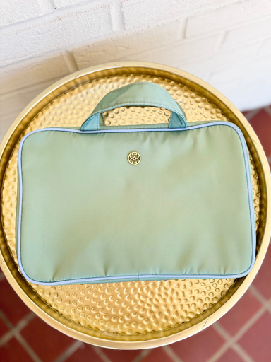 Blue and Green Toiletry bag with handles and pockets inside 