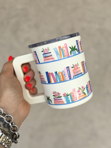insulted mug with books and plants on it 