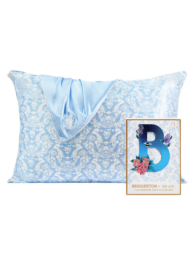 A satin pillowcase with a floral pattern in a light blue color