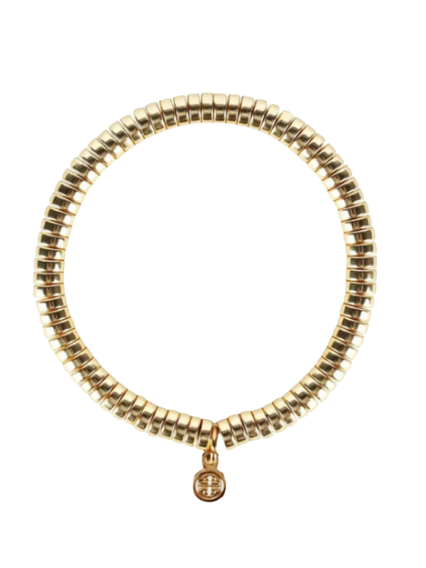 Gold beaded bracelet with a small round charm on a white background