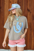 Busy Counting My Lucky Stars Tee by Poppy and Pine with horse shoes and stars on it 