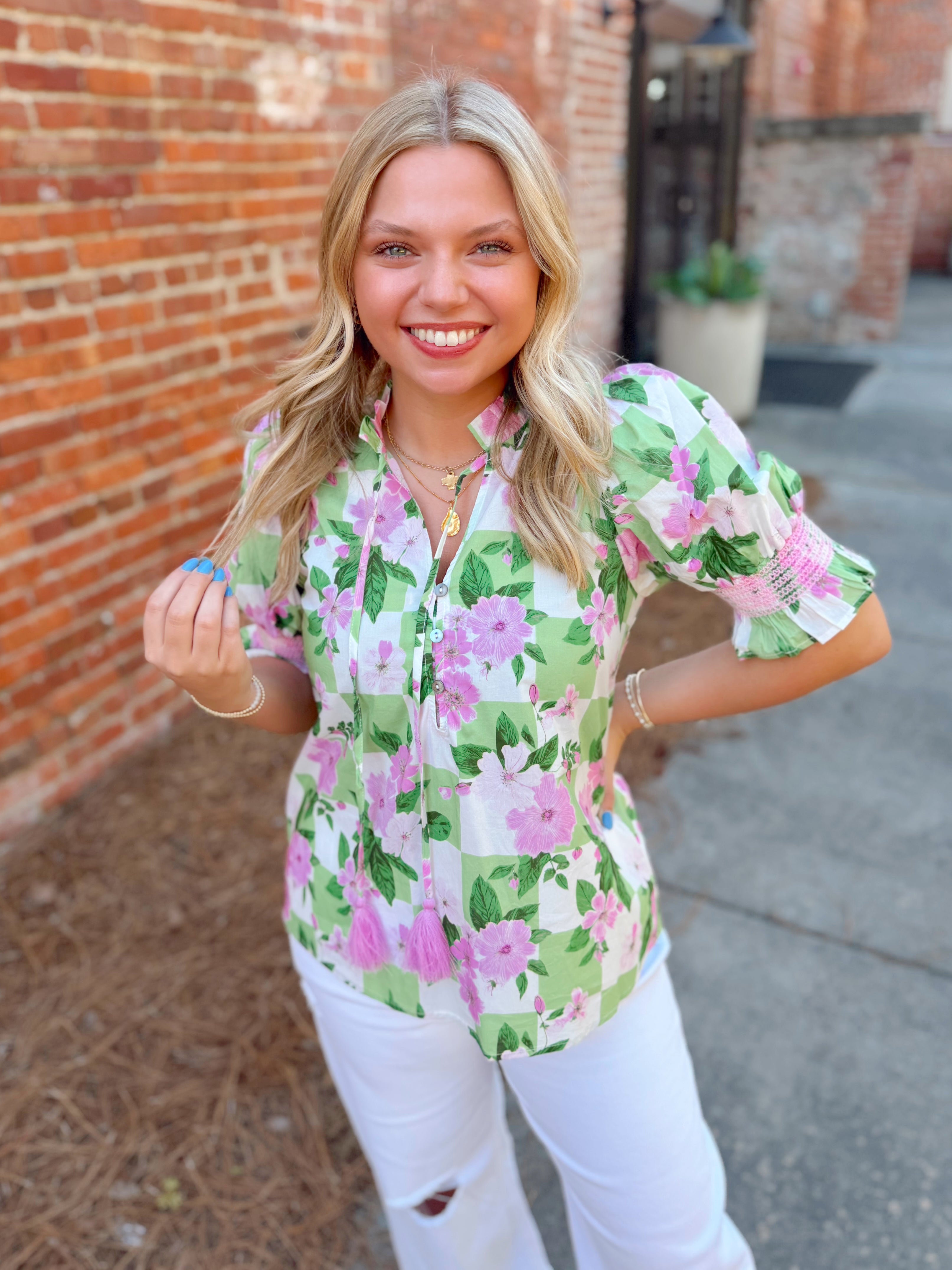 Floral green and pink top with elastic arms