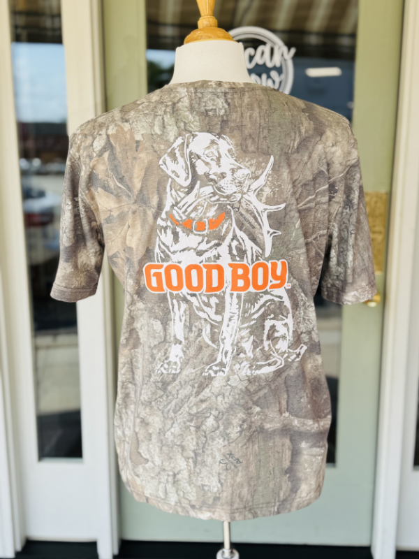 lab dog holding a shed on camo tee