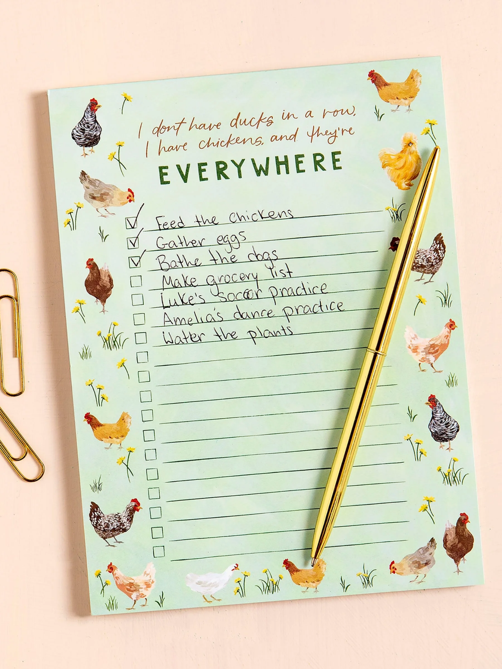 Farmhouse-style notepad with chicken illustrations and the phrase “I don’t have ducks in a row, I have chickens and they’re everywhere,” featuring checklist lines for tasks.