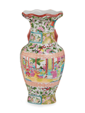 Decorative vase with colorful floral ans design on a white background