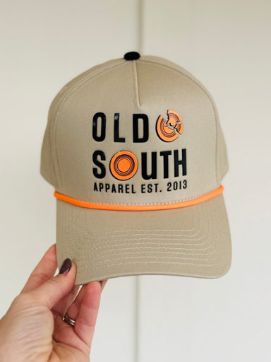 tan hat with orange clay skeet on front 