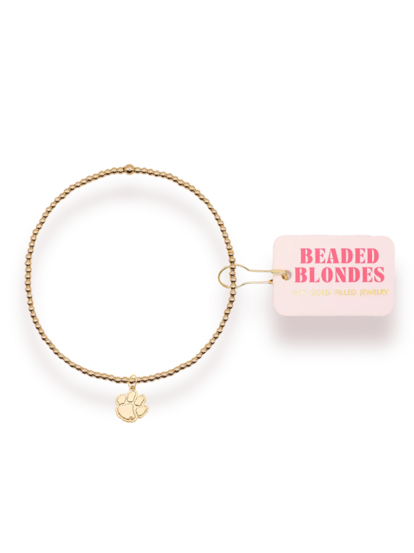 Gold beaded bracelet with a gold paw charm 