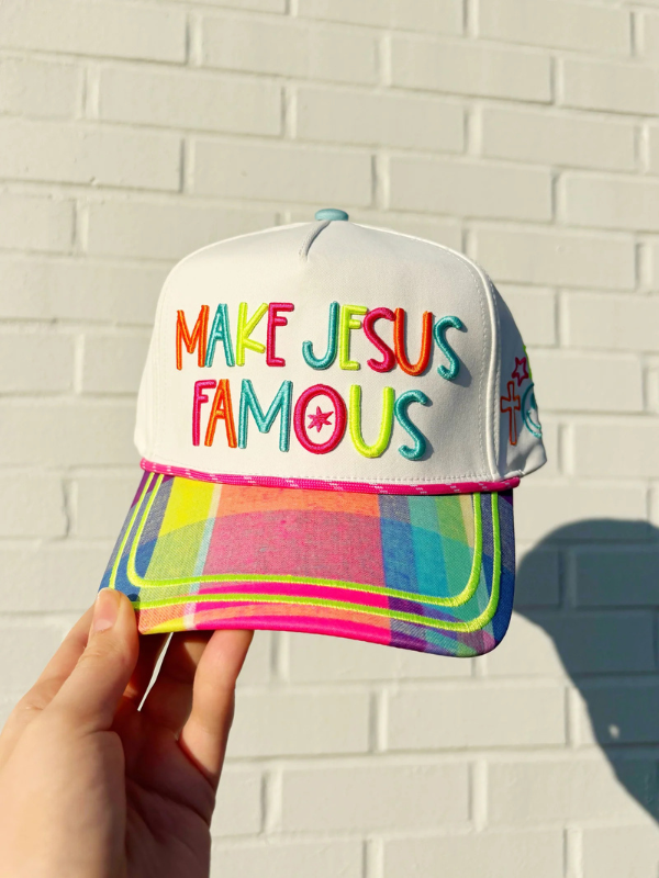 hat with colorful saying and canvas