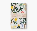 Colorful floral tea towel with country life on it