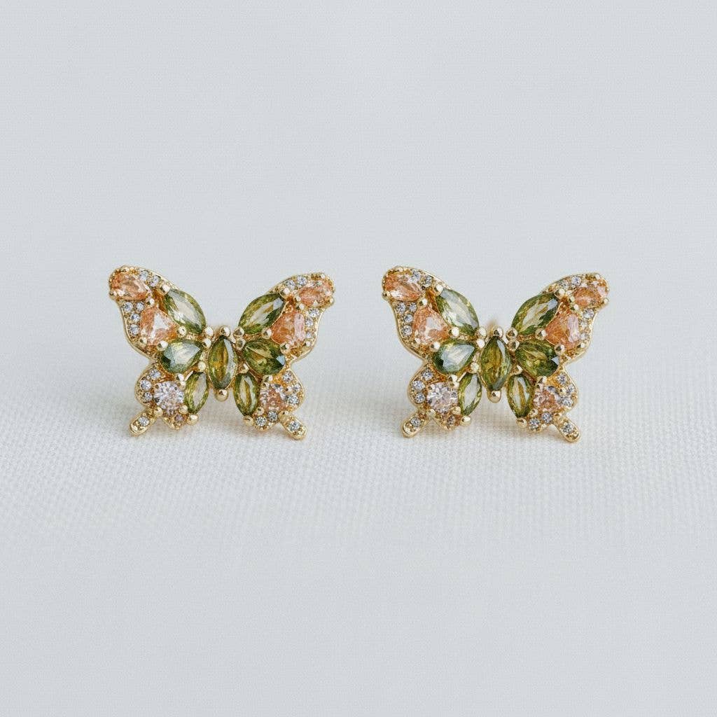 Butterfly shaped stud earrings with green gemstones 
