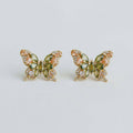 Butterfly shaped stud earrings with green gemstones 