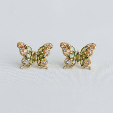 Butterfly shaped stud earrings with green gemstones 