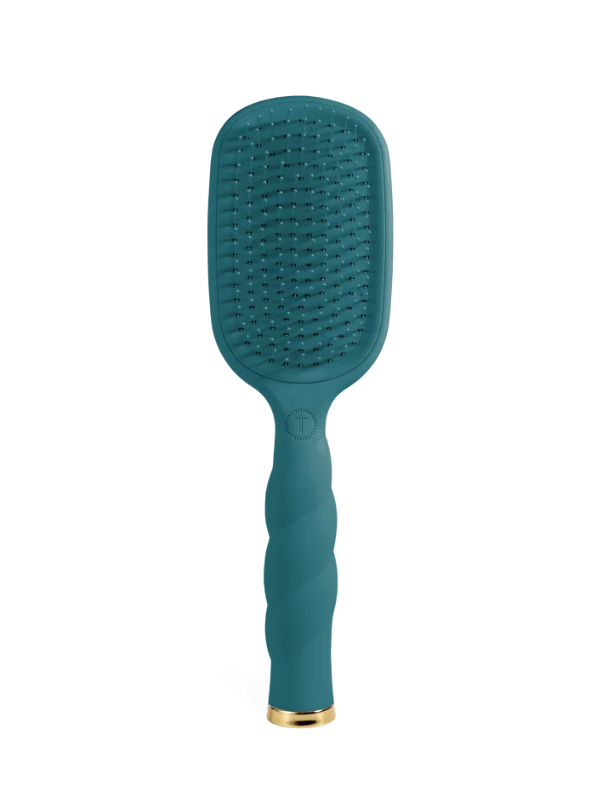 A teal green paddle hairbrush with a twisted handle and a gold accent at the base