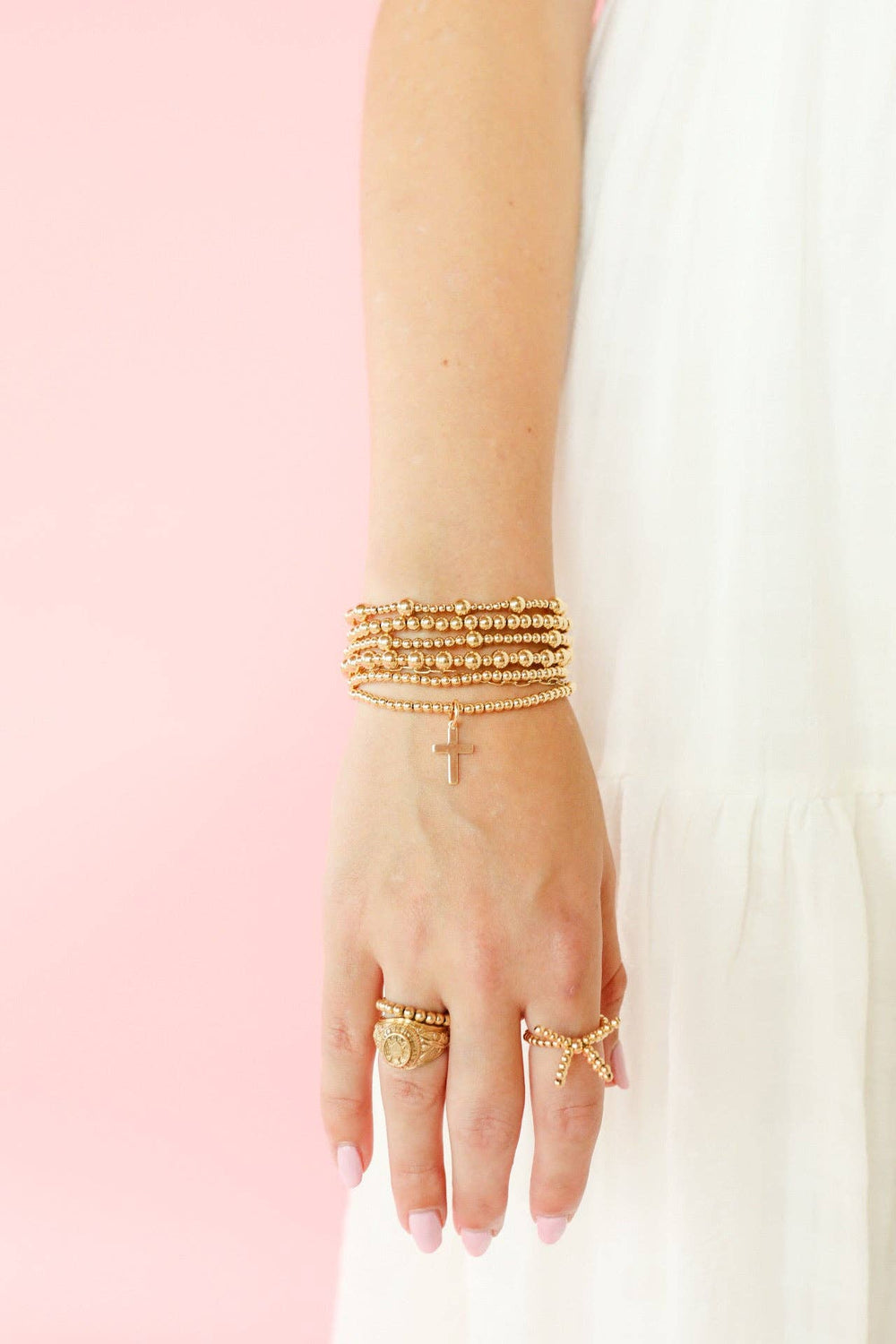  extended Cross Gold Charm Bracelet By Beaded Blonde hanging