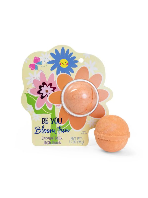Coconut milk bath bomb with colorful packaging featuring flowers and "Be You Bloom True"
