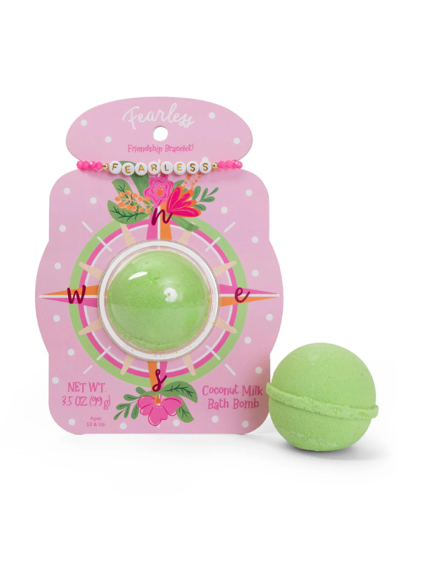 A green bath bomb with packaging that comes with friendship bracelet that says "fearless"