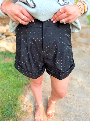 Black shorts with rhinestone sequins on them 
