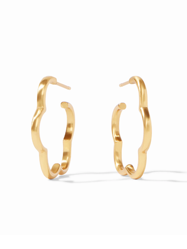 Gold hoop earrings on a white background