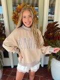  This oversized sweatshirt features gingham lettering with matching gingham trim at the neckline, cuffs, and hem for a fun fall finish. 