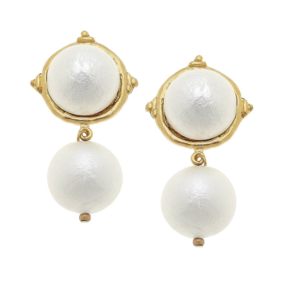 Pair of pearl earrings with gold accents on a white background