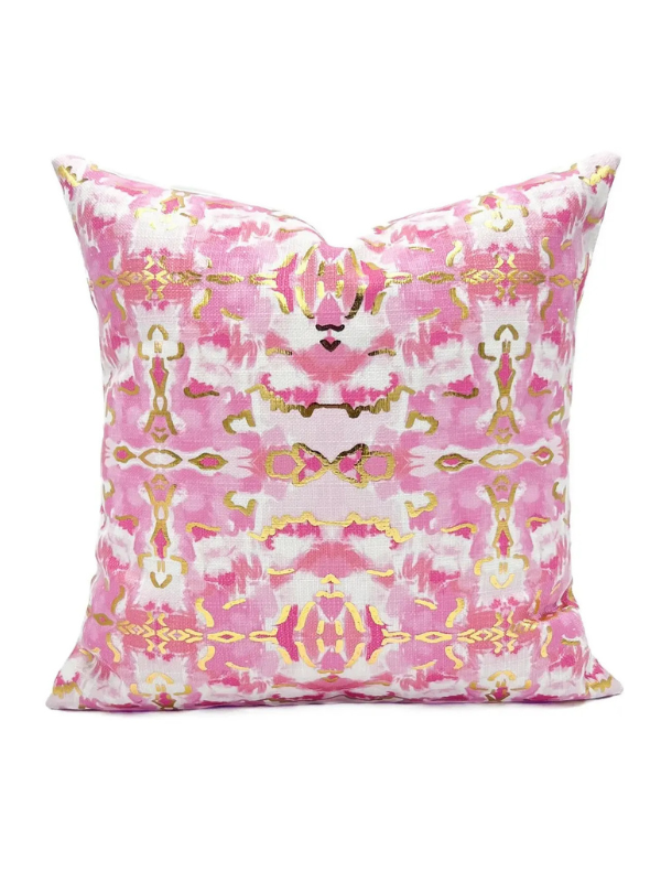 Decorative pillow with pink and gold pattern