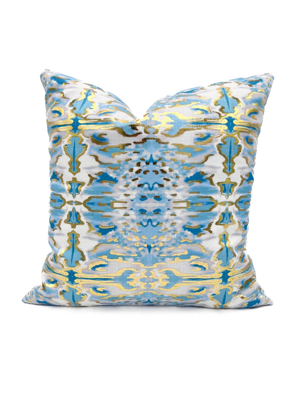 Decorative pillow with blue and gold abstract pattern 