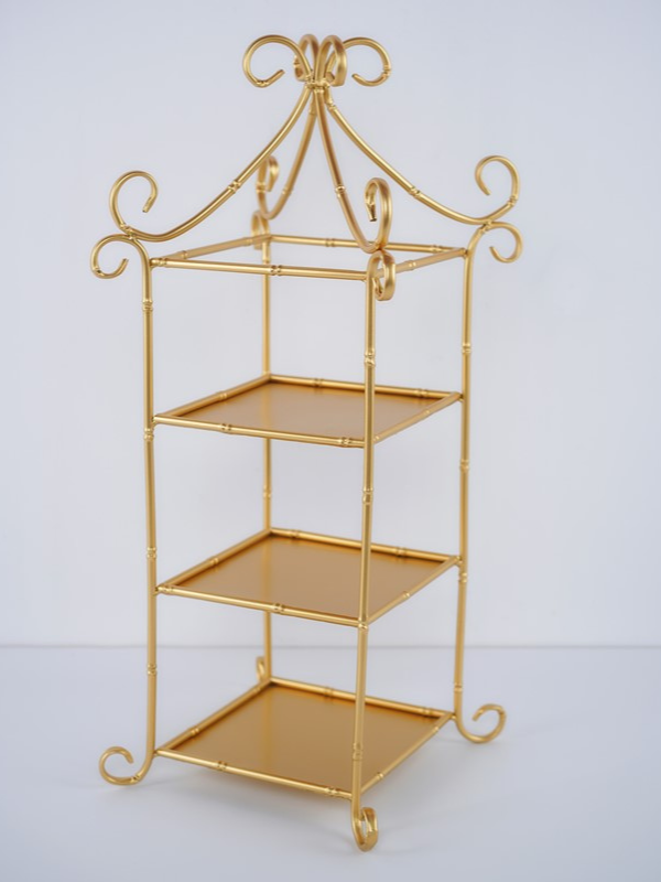 Gold metal 3 tiered display with a decorative top