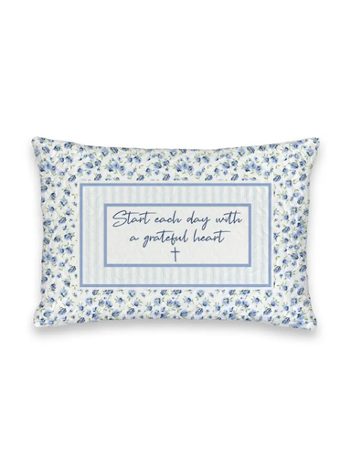 Floral-patterned pillow with motivational quote