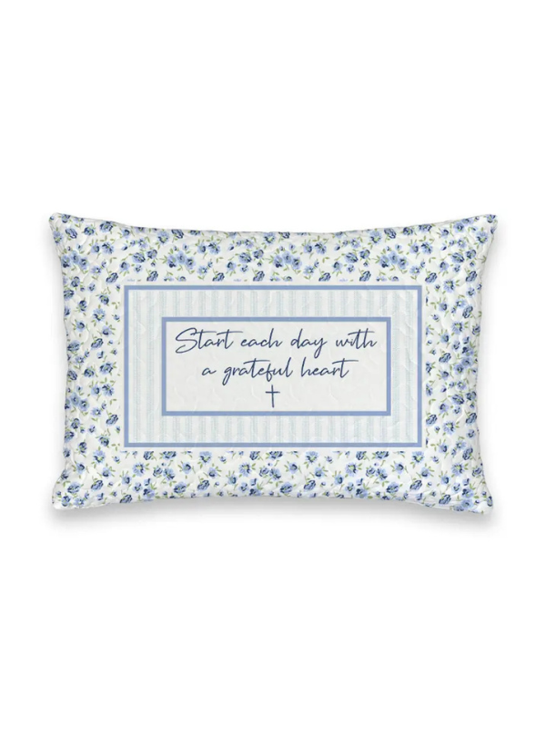 Floral-patterned pillow with motivational quote