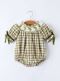 Green and white checkered baby romper with embroiderey