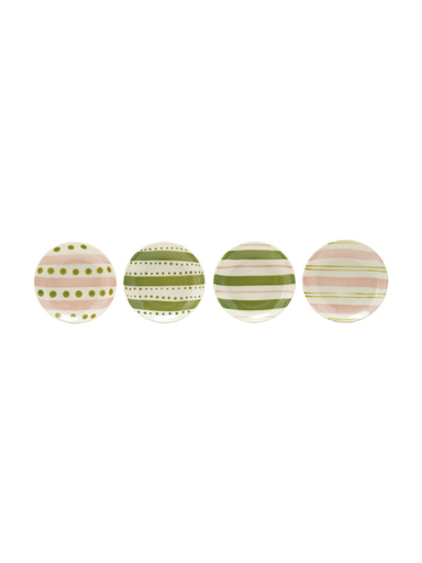 Four round decorative plates lined up horizontally, each featuring a different pastel pattern including stripes, dots, and polka dots in pink, green, and cream.