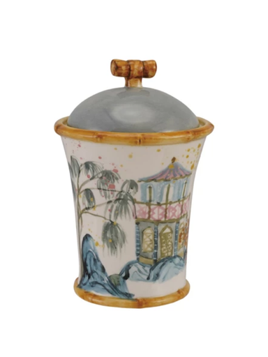 Decorative ceramic jar with lid featuring artistic design on a white background
