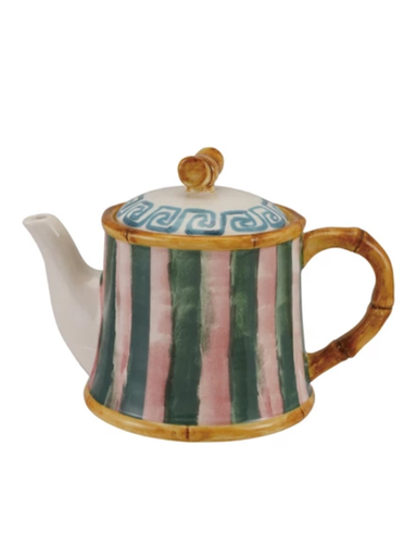 Ceramic teapot with striped design on a white background