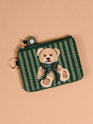 This hand-beaded coin purse features a sweet teddy bear design on a rich green striped background, complete with a coordinating bow and beaded zipper pull.